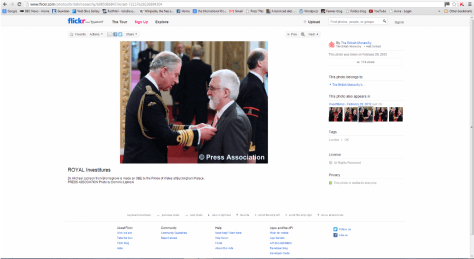 Receiving my medal from HRH The Prince of Wales (screenshot from The British Monarch website)
