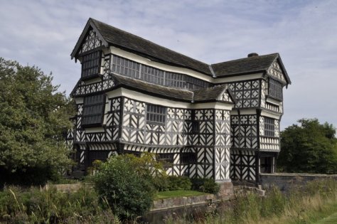 The main entrance to Little Moreton Hall, over the moat. This photo shows the south face of the hall.
